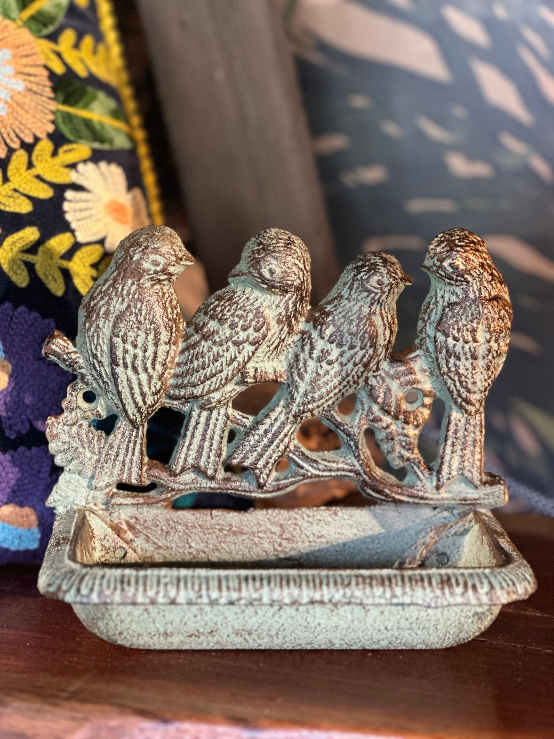 A Statue Of Birds Sitting On A Branch On A Table — Burnetts On Barney in Kiama, NSW