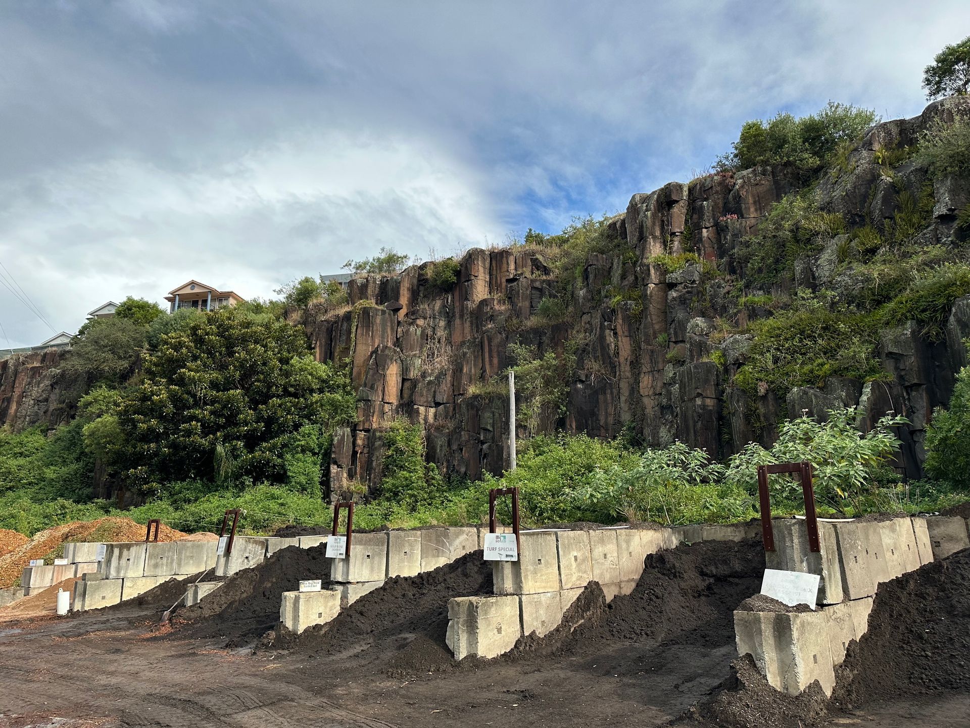 A Pile Of Dirt Is Sitting In Front Of A Mountain — Burnetts On Barney in Gerringong, NSW