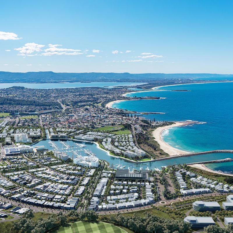 An Aerial View Of A River Surrounded By Houses And Trees — Burnetts On Barney in Shell Cove, NSW