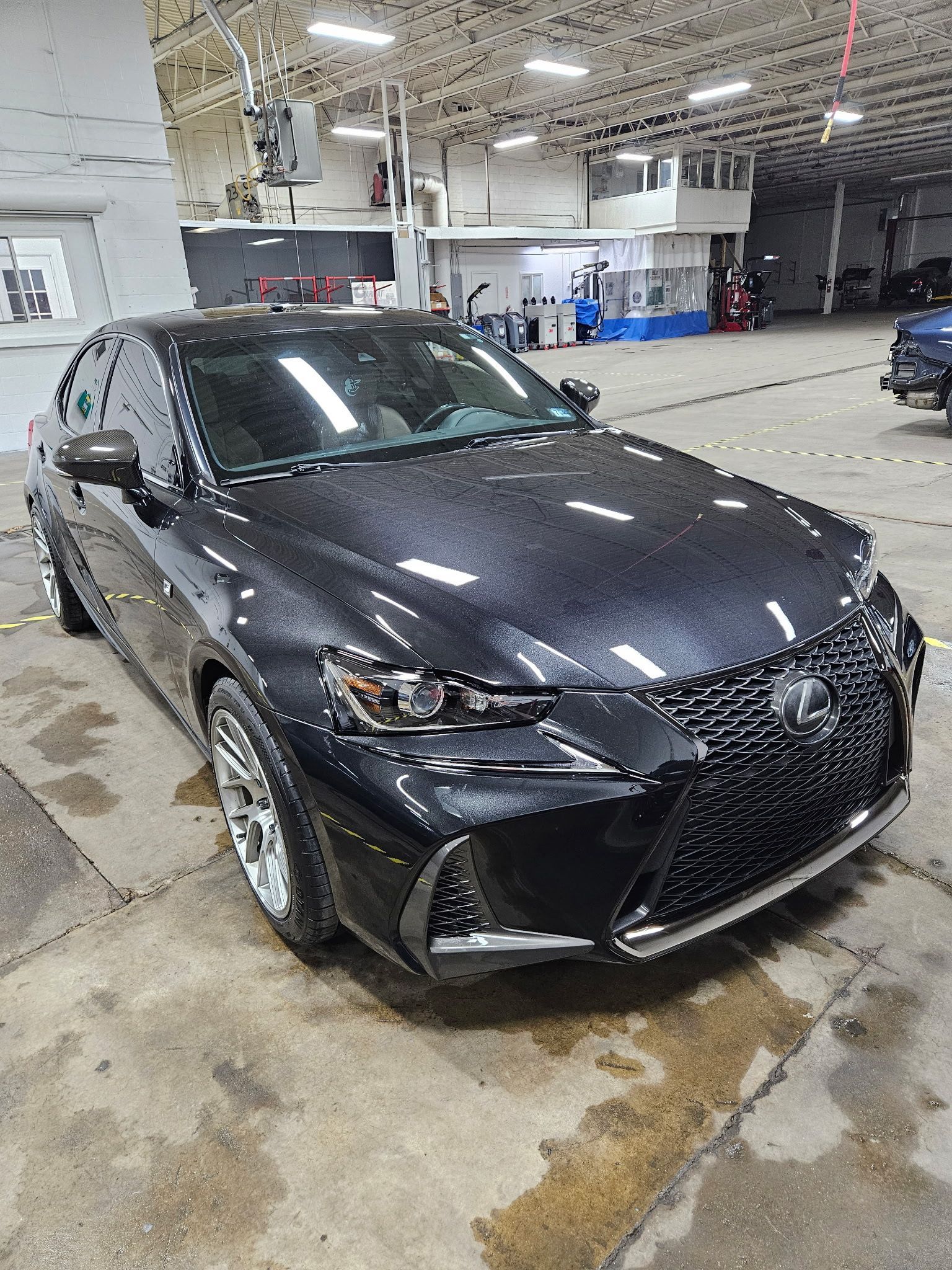 Black Lexus in shop