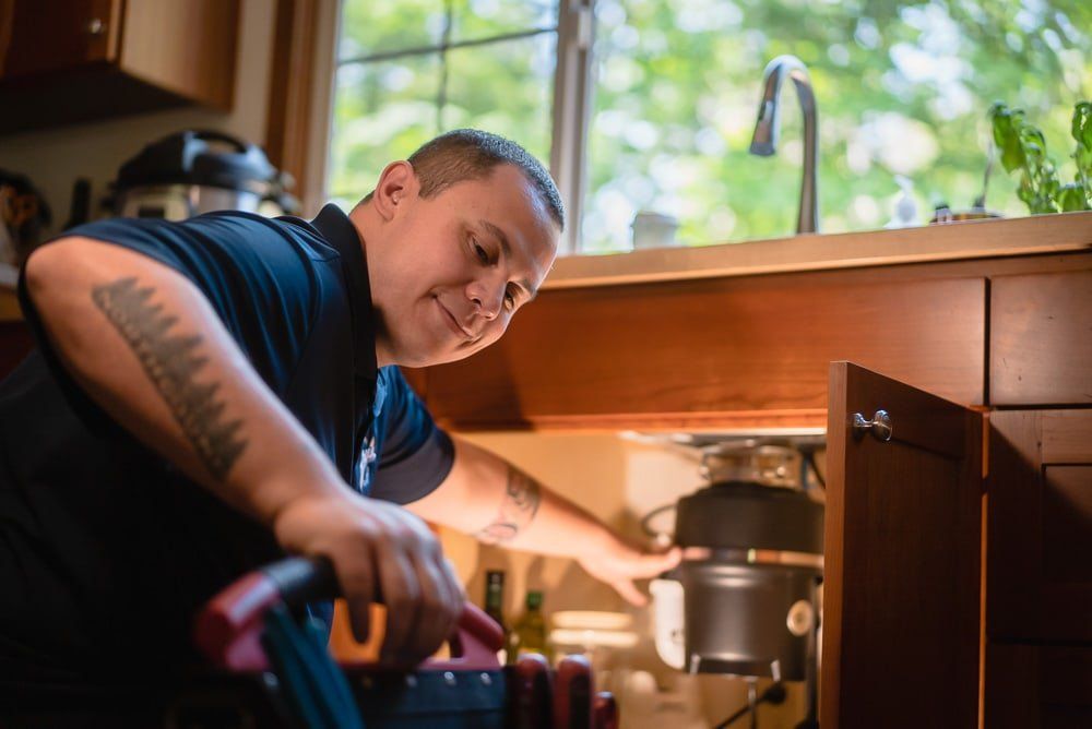Photo of Gary's plumber working