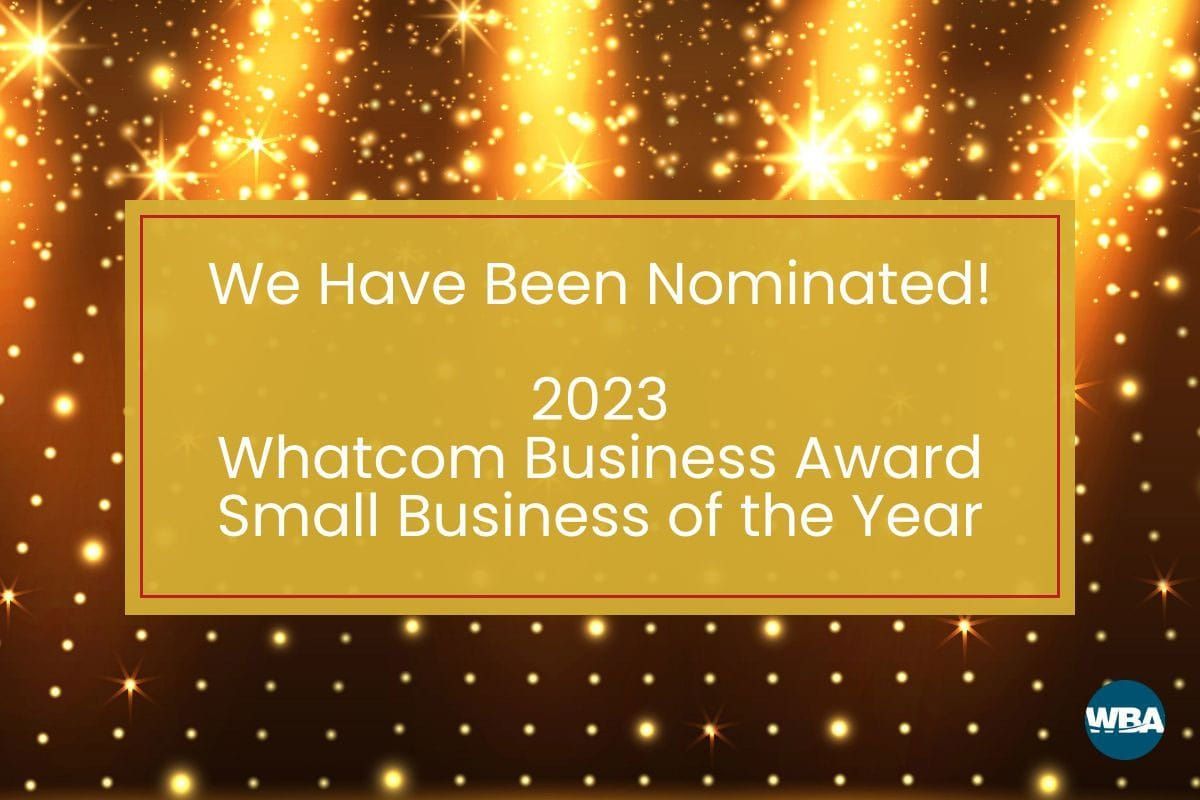 Gold award graphic reading “We Have Been Nominated! 2023 Whatcom Business Award Small Business of the Year”