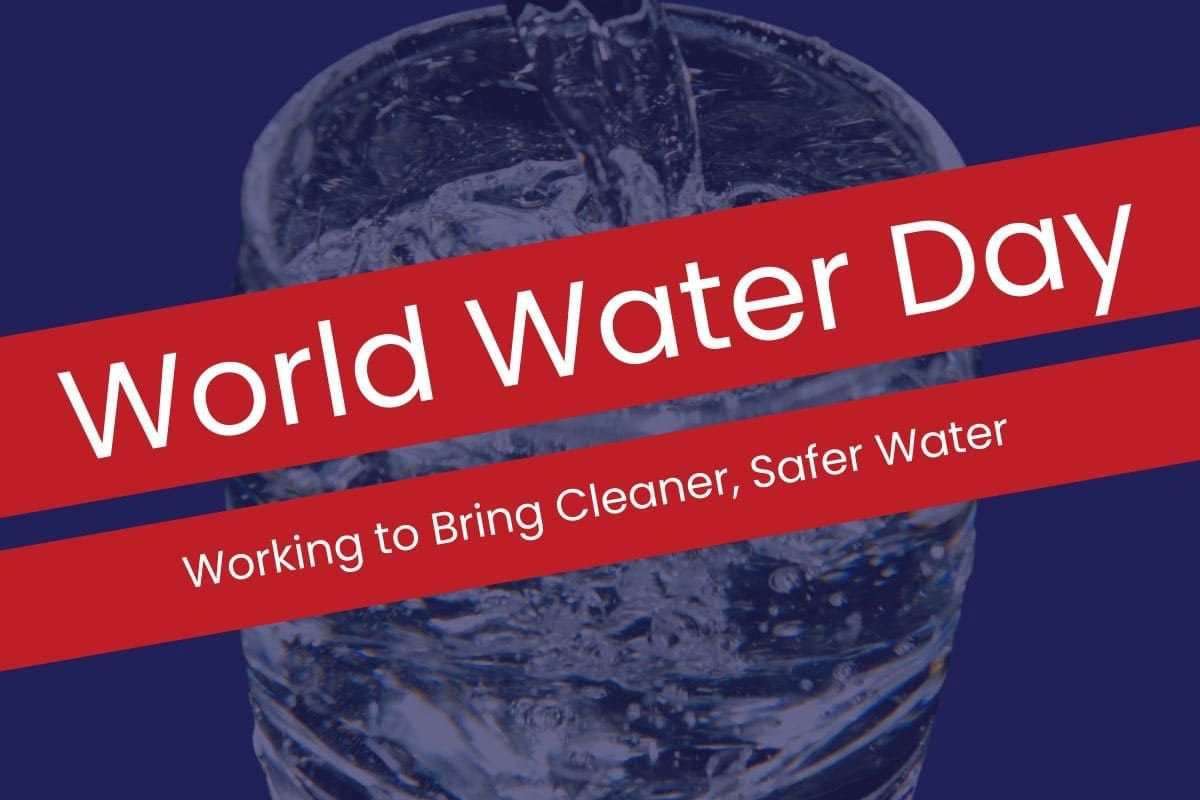 World Water Day banner with a water bottle and red diagonal ribbon reading “Working to Bring Cleaner, Safer Water”