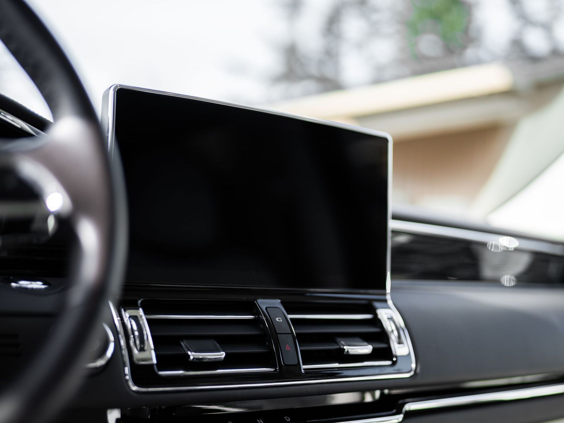 Clean dashboard and touchscreen after an interior detail