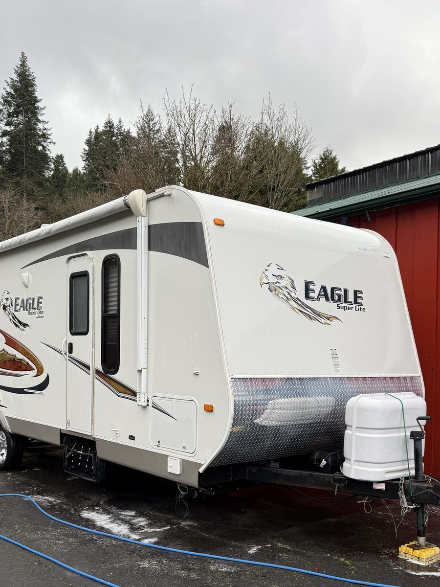Same travel trailer front cap clean and bright after KeptCar mobile RV wash in Albany, Oregon