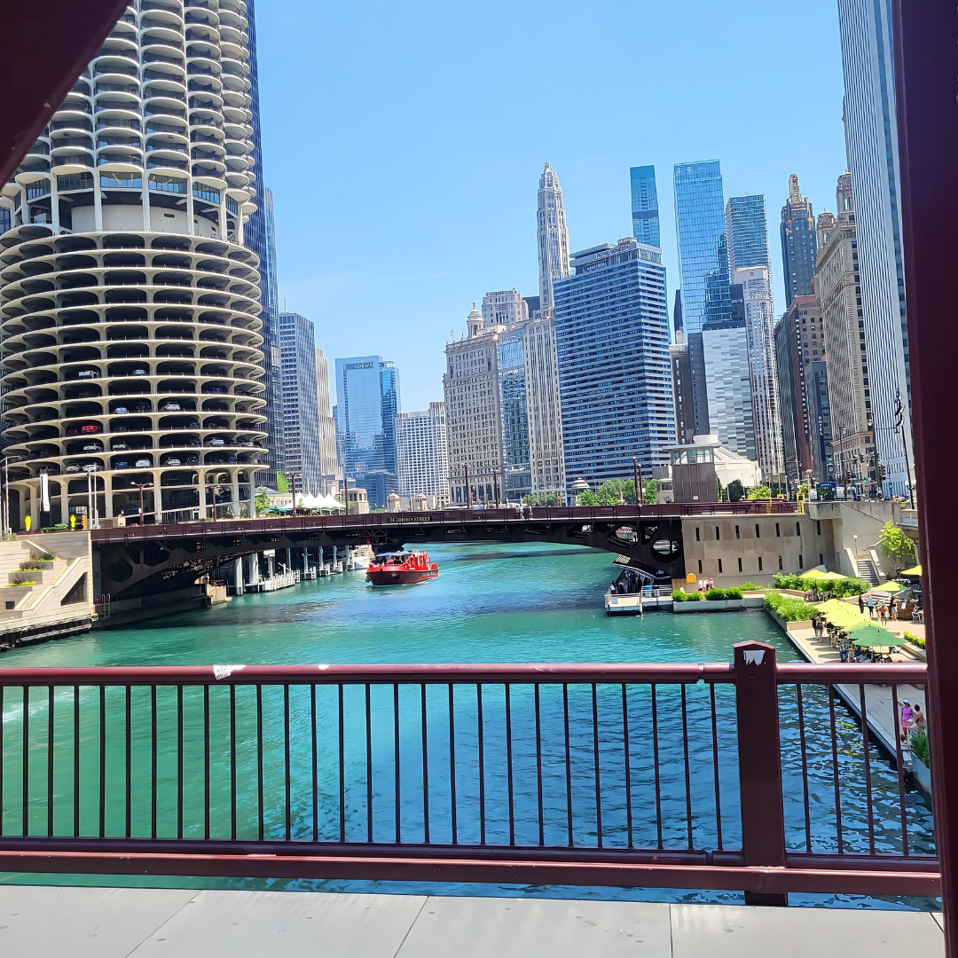 The iconic architecture along the Chicago River, a beautiful view you can experience on a pedicab city tour or a bike taxi chicago adventure.