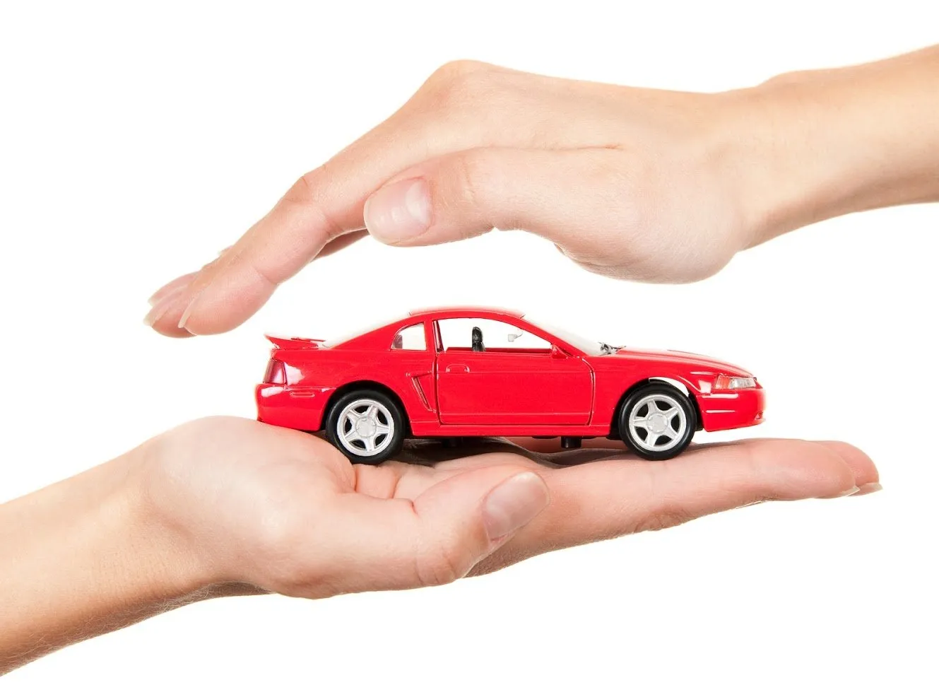 Two Hands Holding Car Toy | Omaha, NE | Accredited Insurance Group