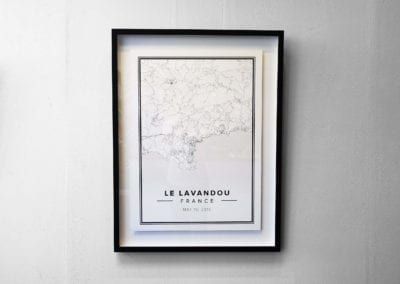 A framed map of france is hanging on a white wall. Fulham Framing | Bespoke Picture Framing