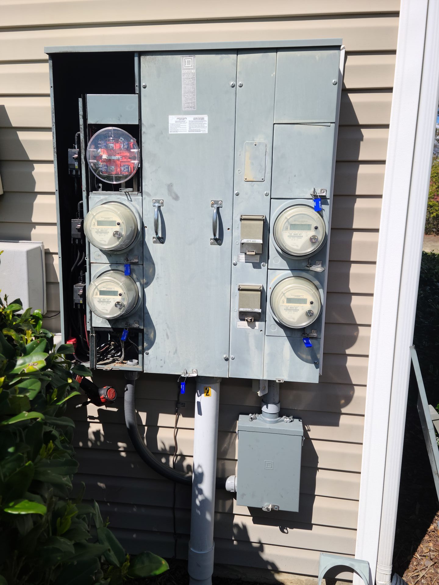 An electrical box with a bunch of meters on it