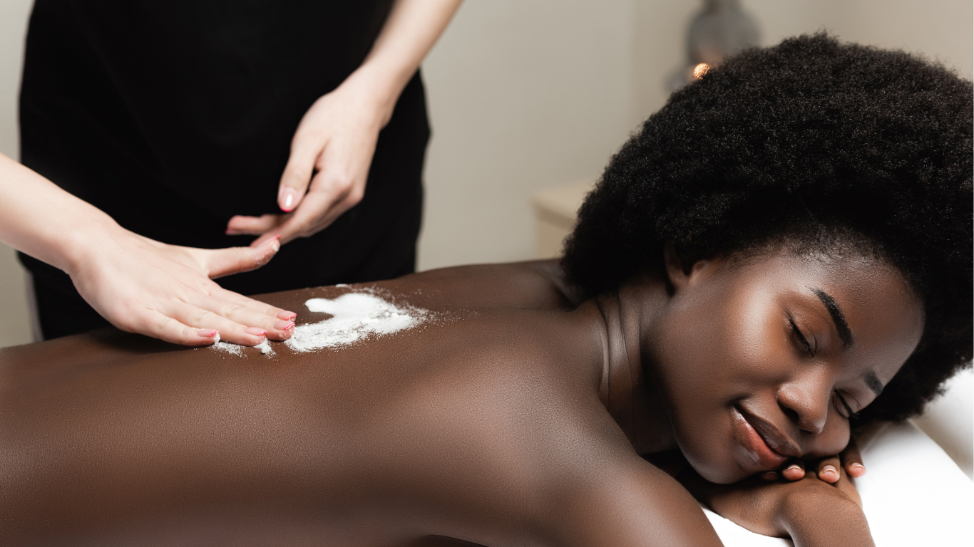 a woman is getting a massage at a spa .