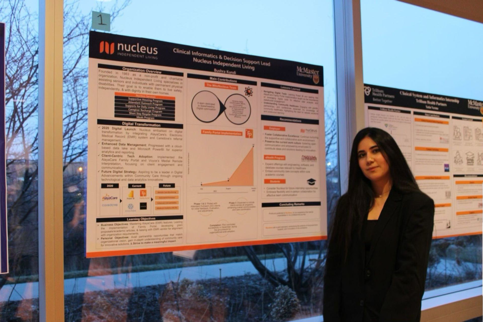 A woman presents a Nucleus research poster