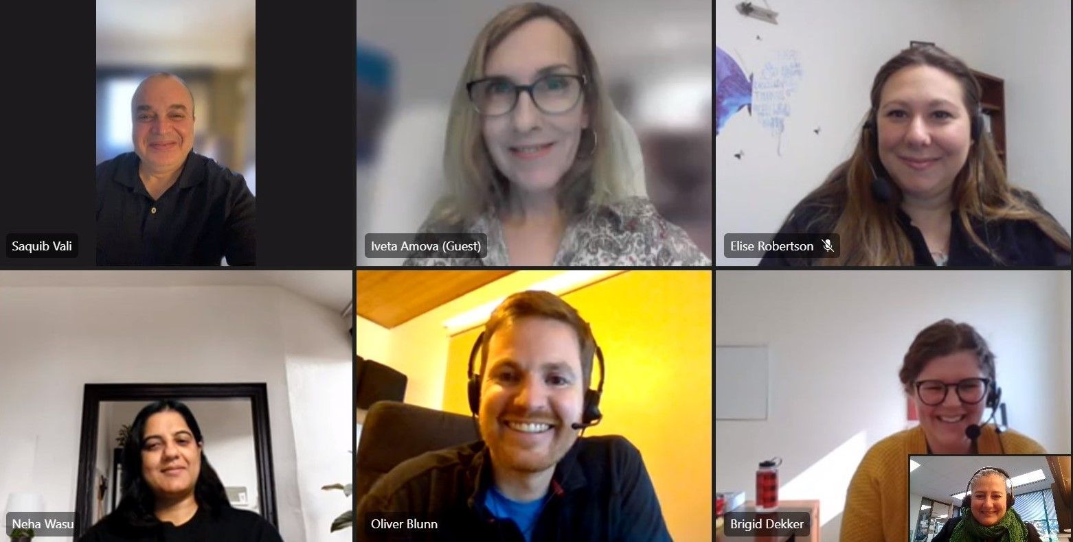 A group of people are having a video call on a computer.