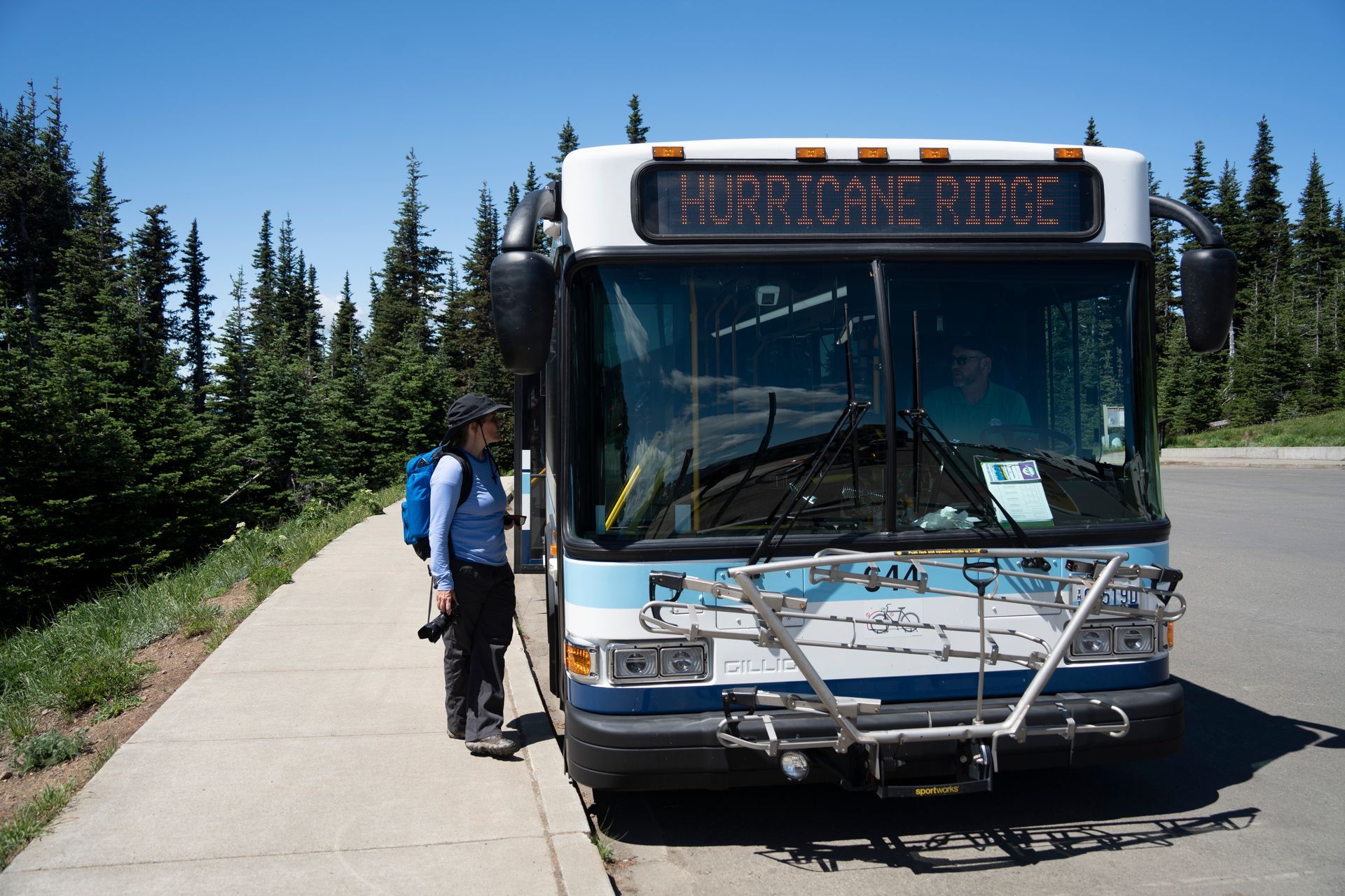 Passenger getting on the Hurricane Ridge shuttle.