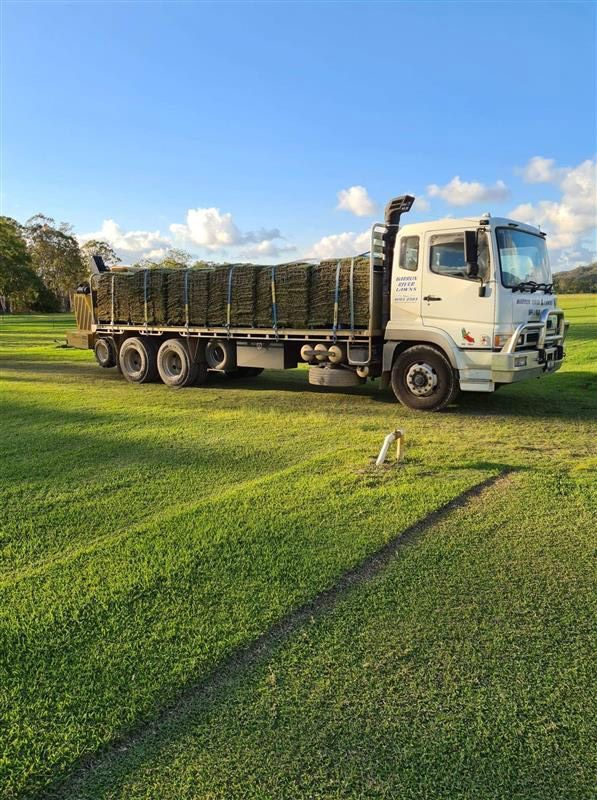 A Truck Carrying A Bunch Of Turf — Barron River Lawns In Biboohra, QLD