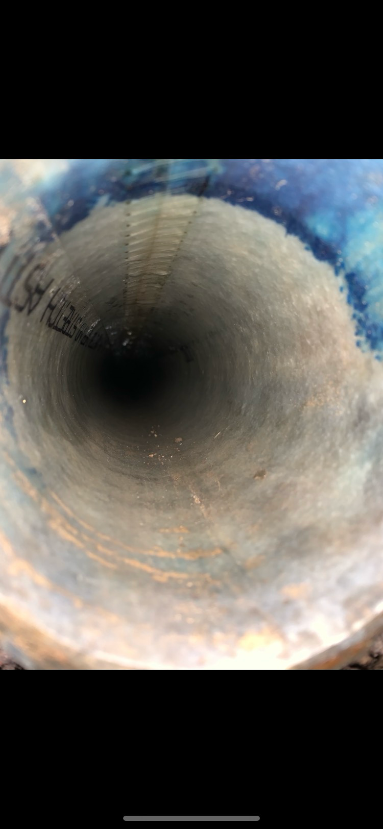 A close up of the inside of a pipe.