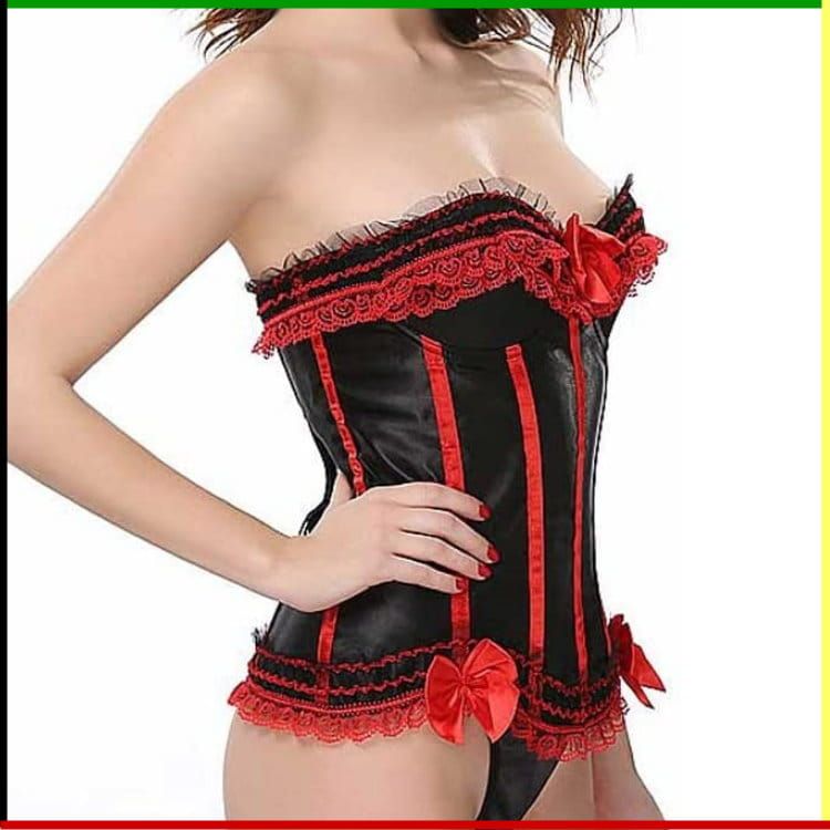Een zwart-rood korset met ruches en strikken, gedragen door een persoon.