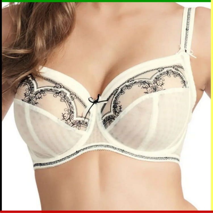 Witte bh met zwarte borduurdetails.