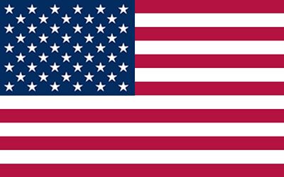 The american flag is red , white and blue with stars on it.