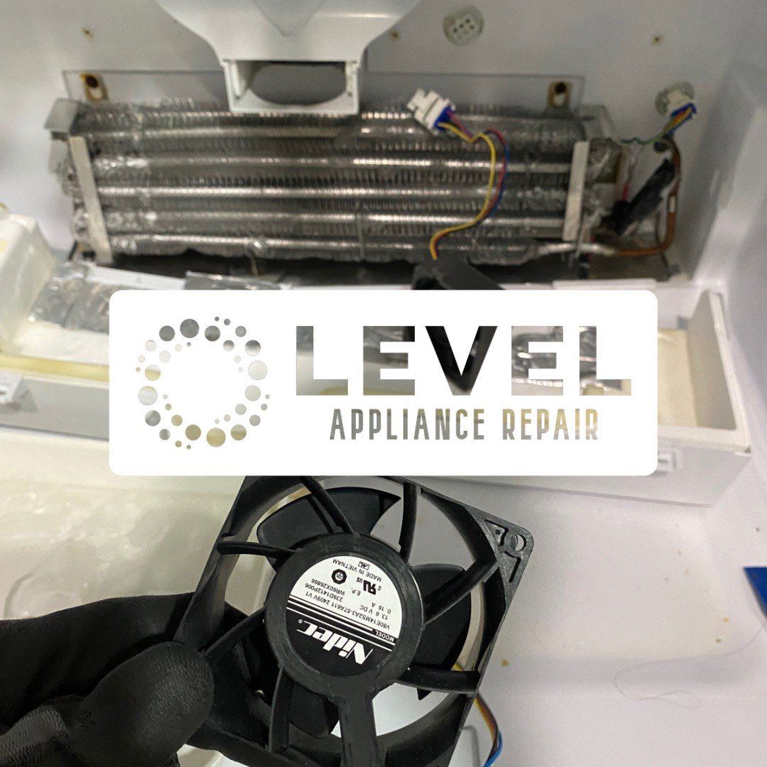 Refrigerator repair: fan being held in front of evaporator coils, with Level Appliance Repair logo.
