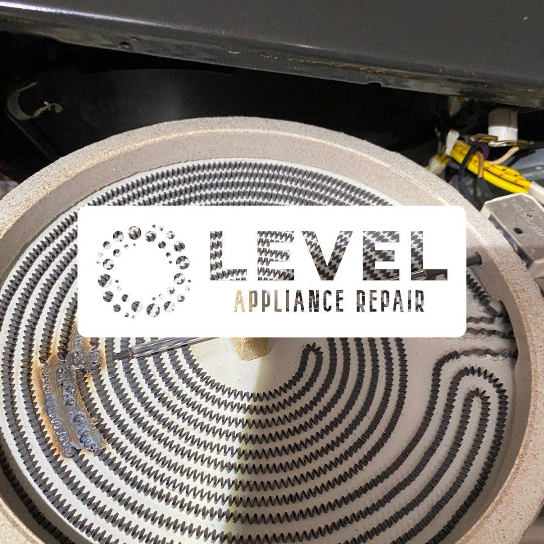 Close-up of a stove's heating element with a Level Appliance Repair sticker in the center.