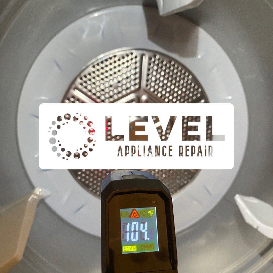 A white dryer drum with a thermometer reading 104°F. A 