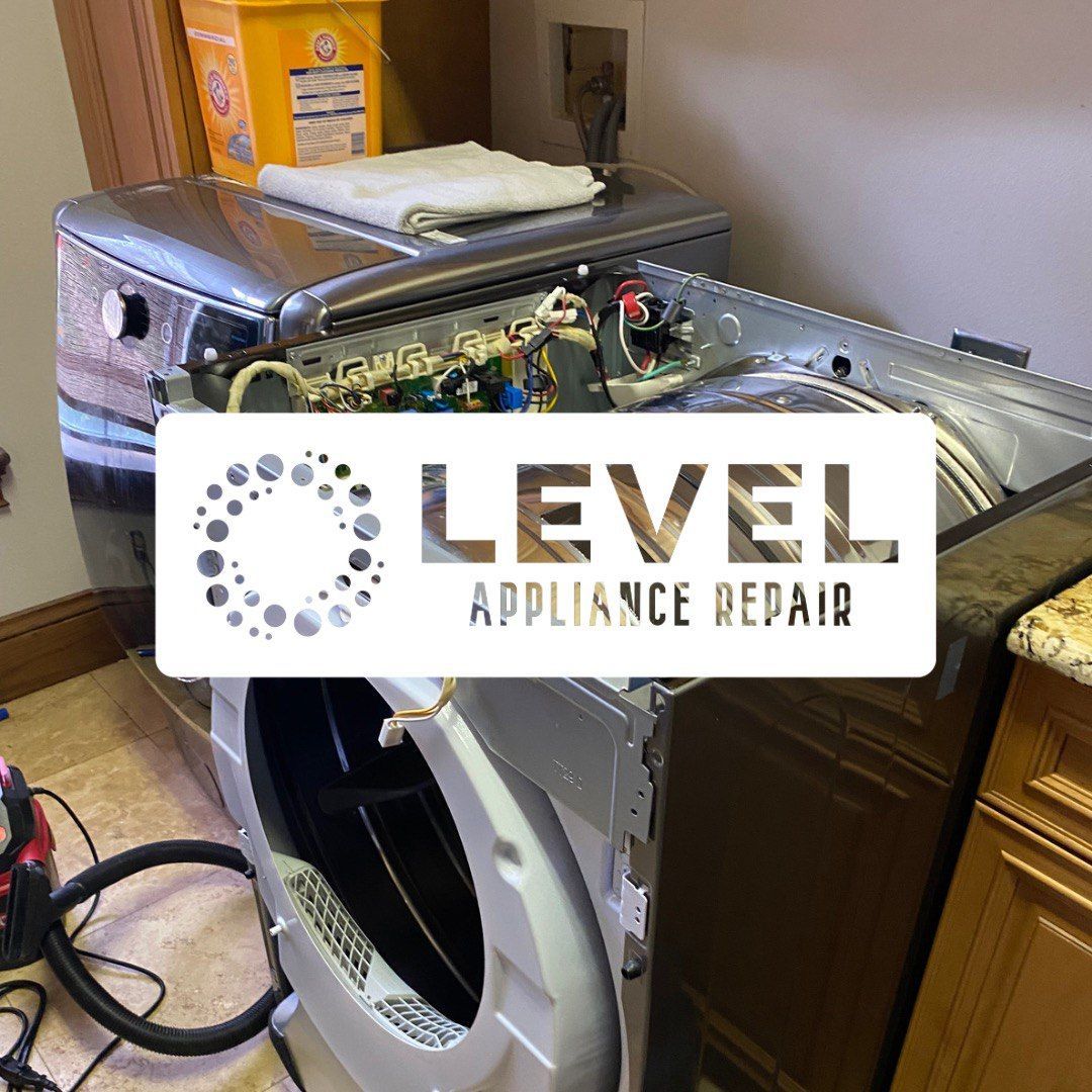 Washer and dryer open for repair with 
