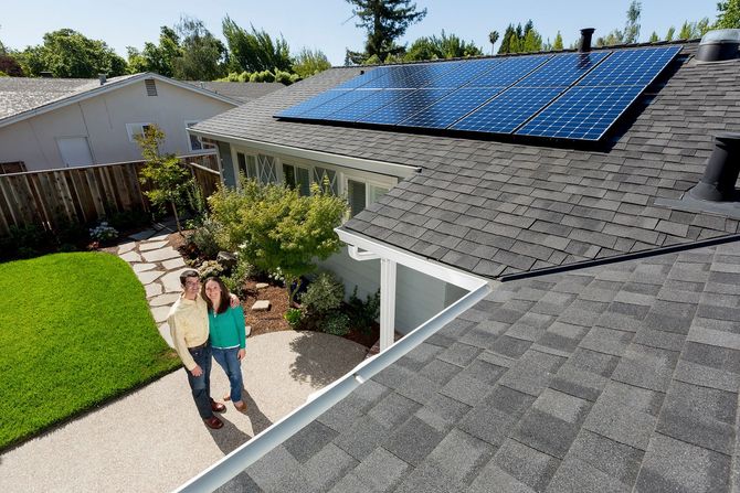 couple solar panel on roof