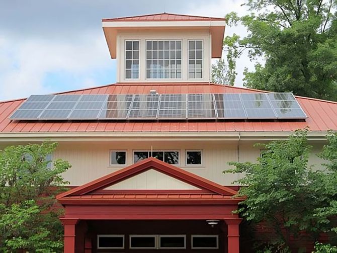 modern house red roof solar