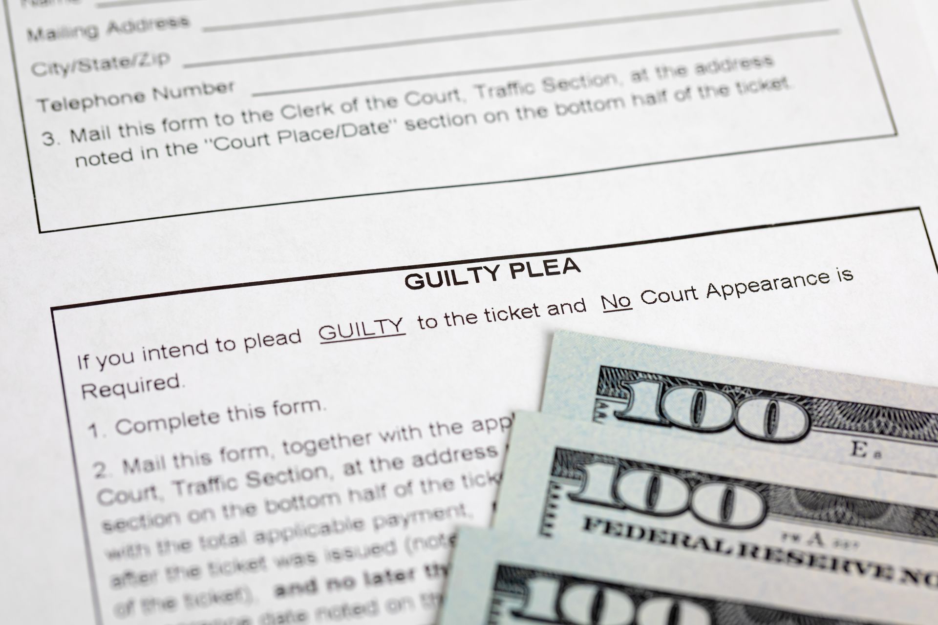 A form for a guilty plea with cash, likely for a traffic ticket. Text is visible.