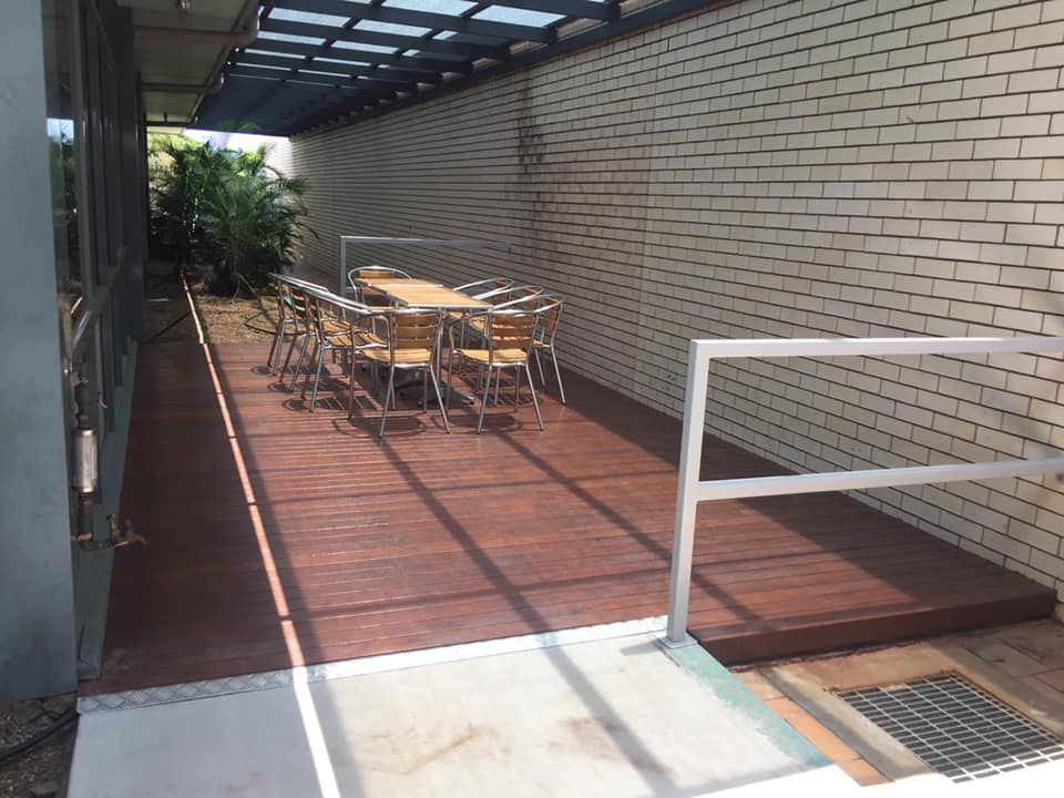 A Patio with A Table and Chairs Under a Canopy — Formosa Building And Renovations in Childers, QLD