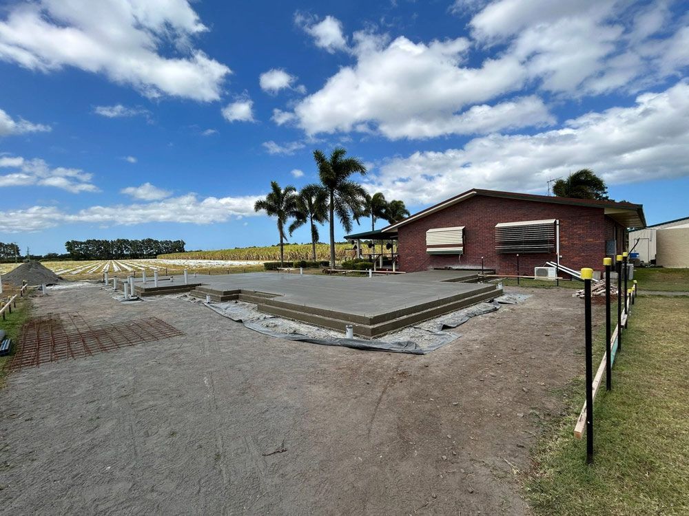 Brown Brick House with Extension Project Going — Formosa Building And Renovations in Kensington, QLD
