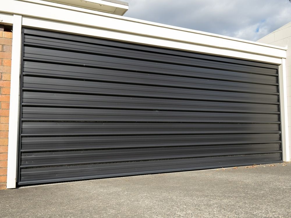 Black Horizontal Panel Garage Door — Duncan's Doors In Pittsworth, QLD
