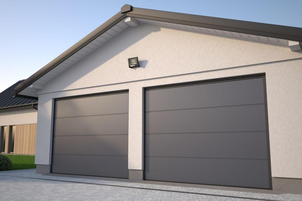 Two-car Garage With Gray Doors and White Walls — Duncan's Doors In Bell, QLD