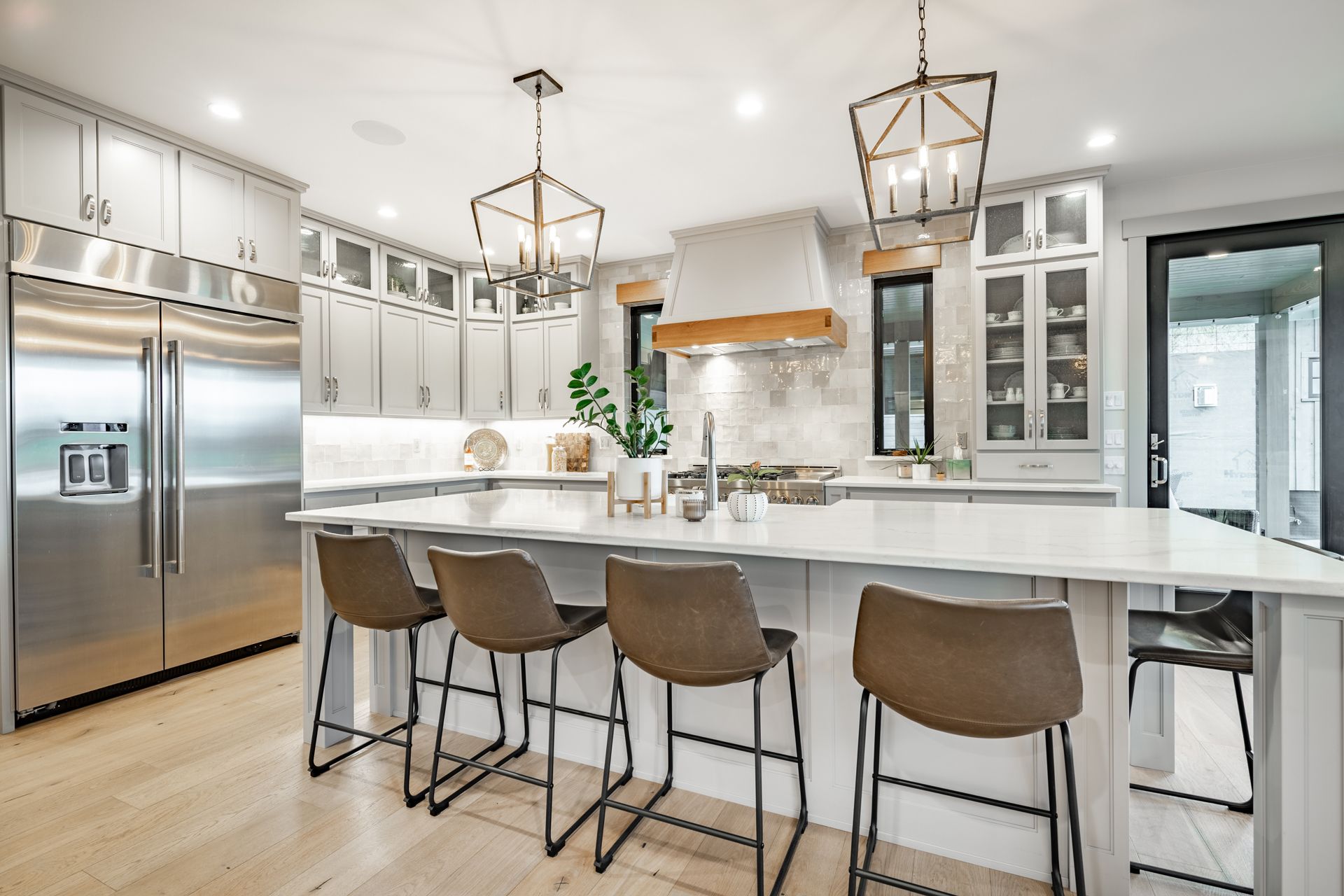 Modern kitchen with white island.