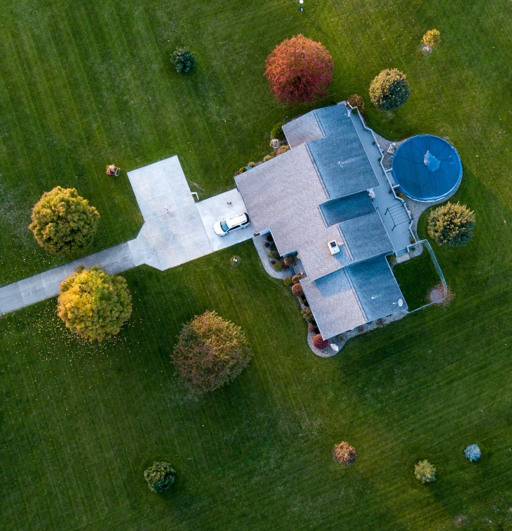 Aerial view of a freshly cleaned lawn with debris removed and grass looking well maintained