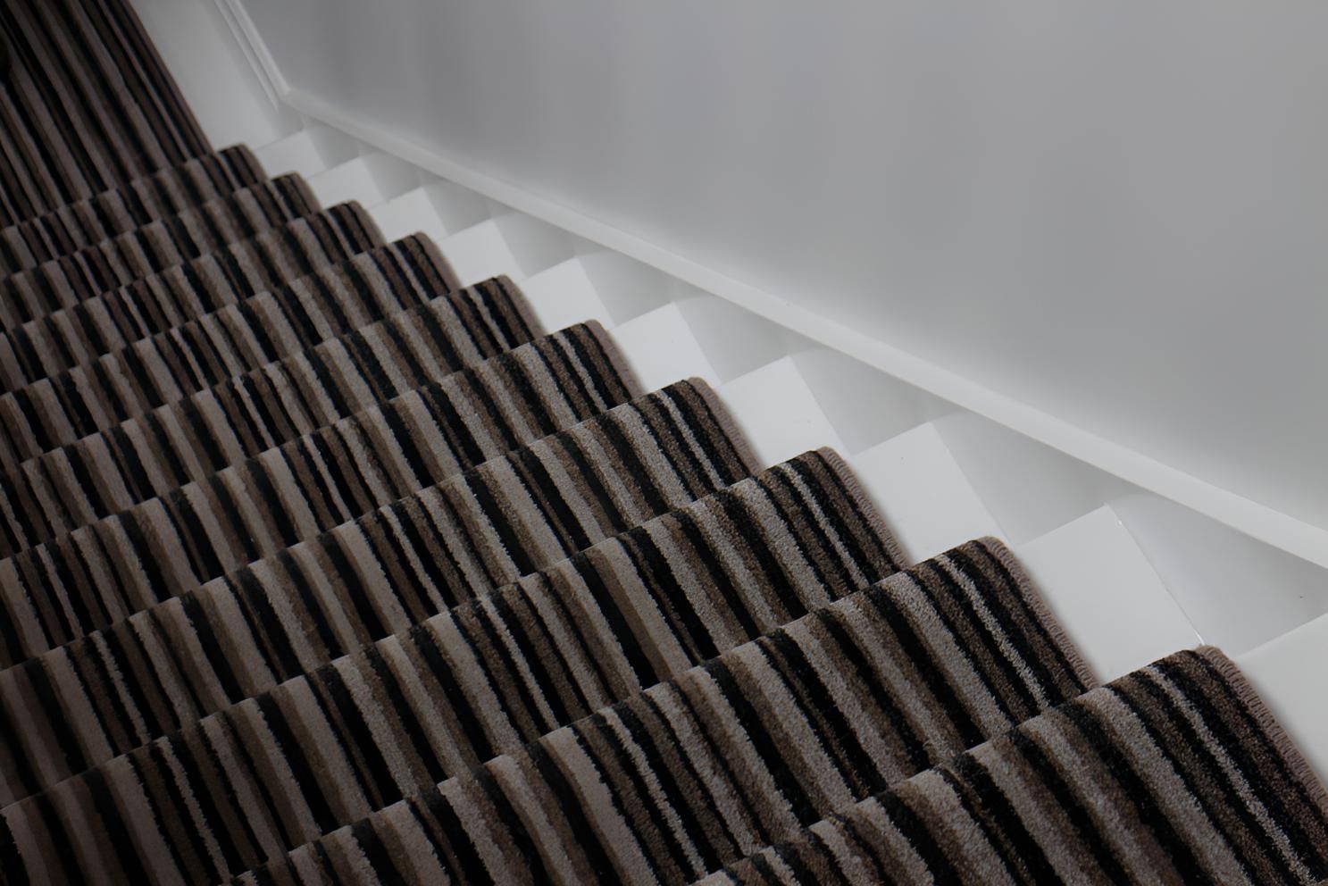 Close Up of a Staircase With a Striped Carpet — Affordable Carpets & Mats in Caboolture, QLD