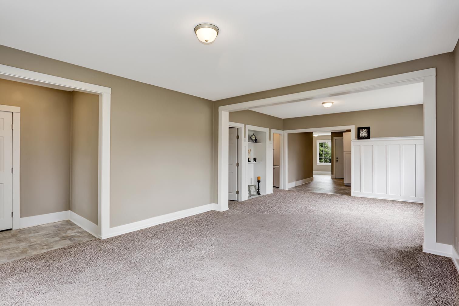 Empty Living Room With a Carpeted Floor — Affordable Carpets & Mats in Morayfield, QLD