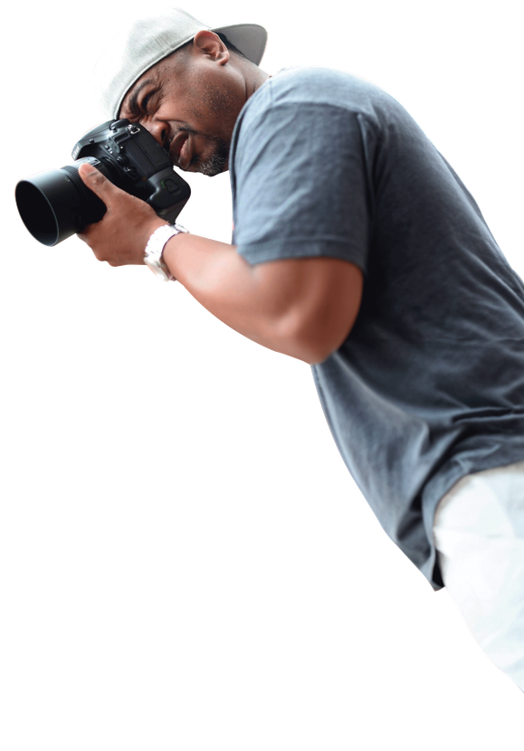 a man is taking a picture with a camera .