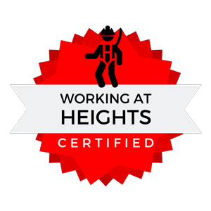 A red jagged badge featuring a black worker icon, with text reading "WORKING AT HEIGHTS CERTIFIED" on a white banner.