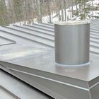 A gray metal roof with standing seams features a circular chimney vent sealed with light-colored flashing.