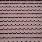 Close-up of a brown, corrugated metal roof with a repetitive, wavy pattern.