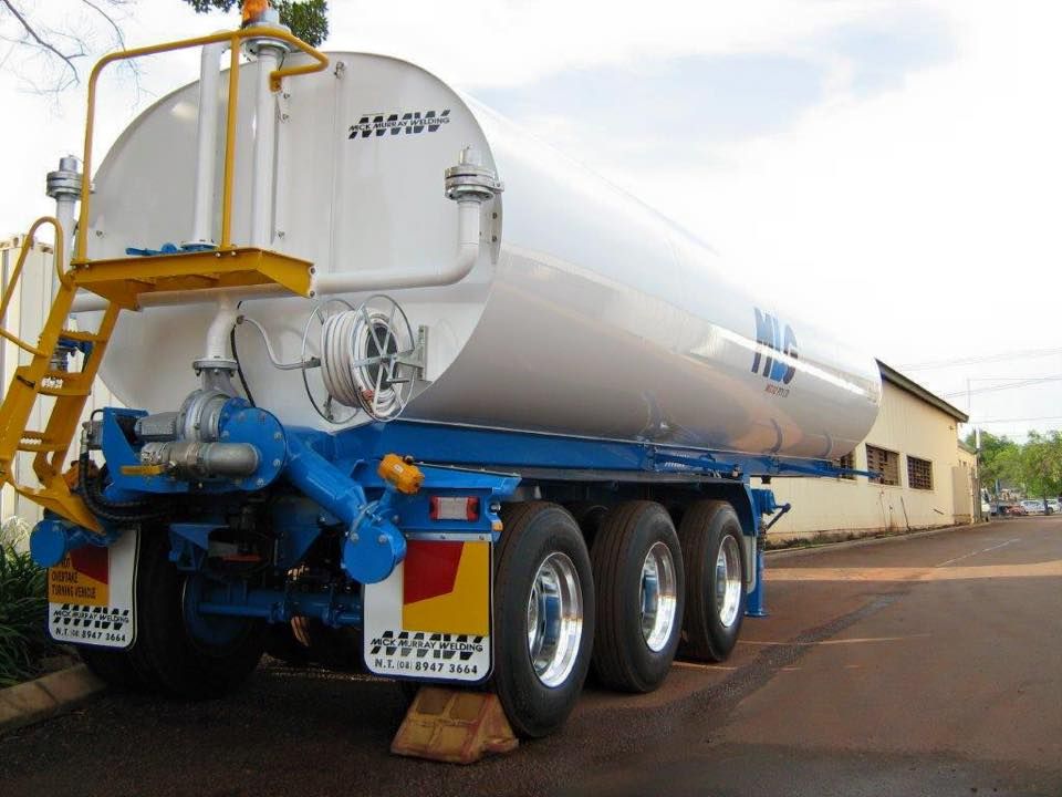 A White and Blue Tanker Truck Parked on A Road — Aust. Advanced Trailer Sales & Service in Berrimah, NT
