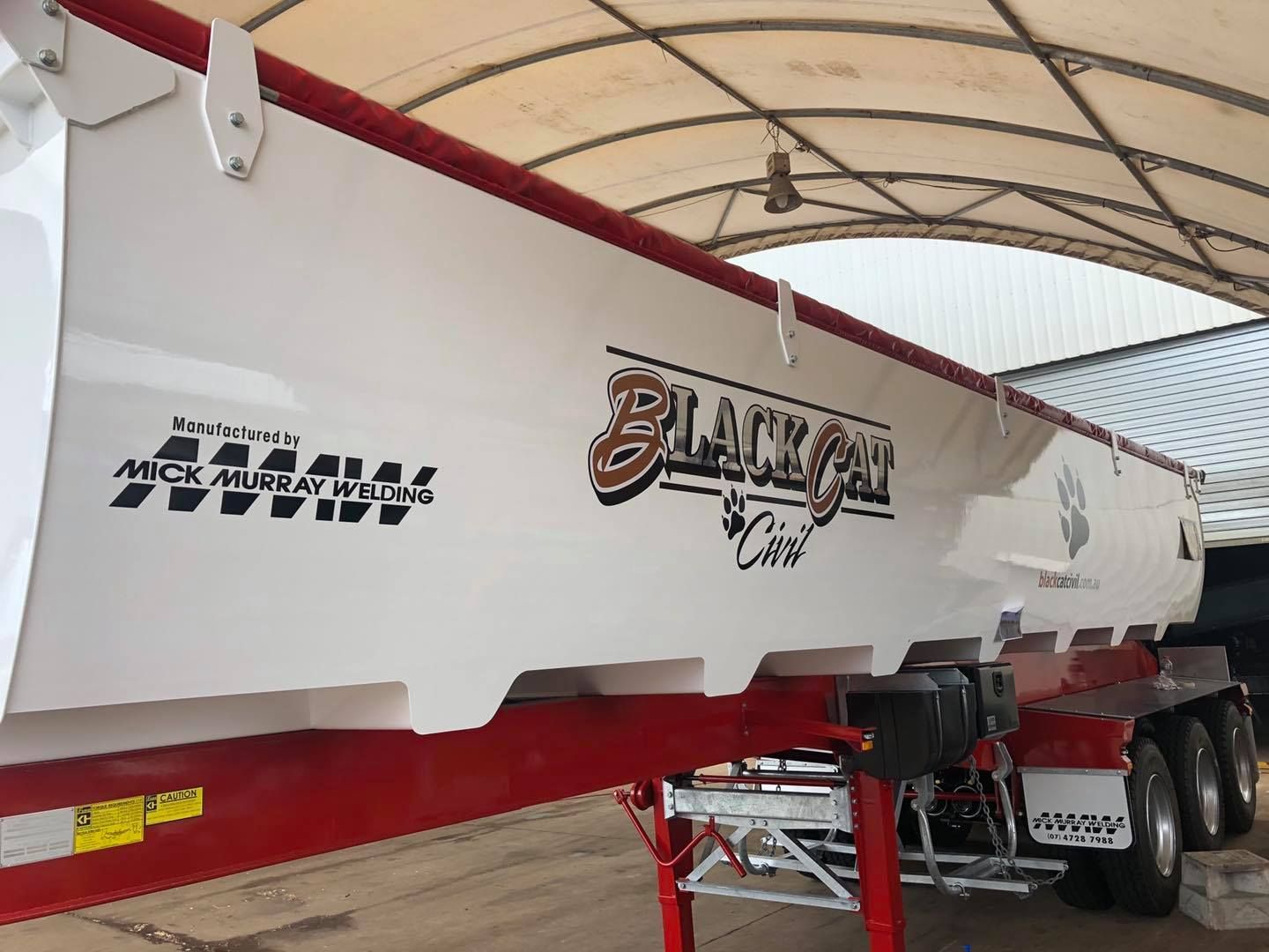 A White and Red Black Cat Tipper Truck Trailer — Aust. Advanced Trailer Sales & Service in Berrimah, NT