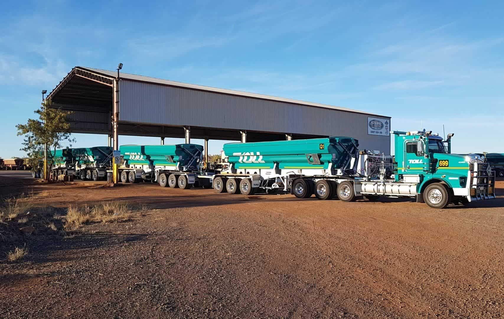 A Trucks and Trailers Parked Under a Shelter — Aust. Advanced Trailer Sales & Service in Alice Springs, NT