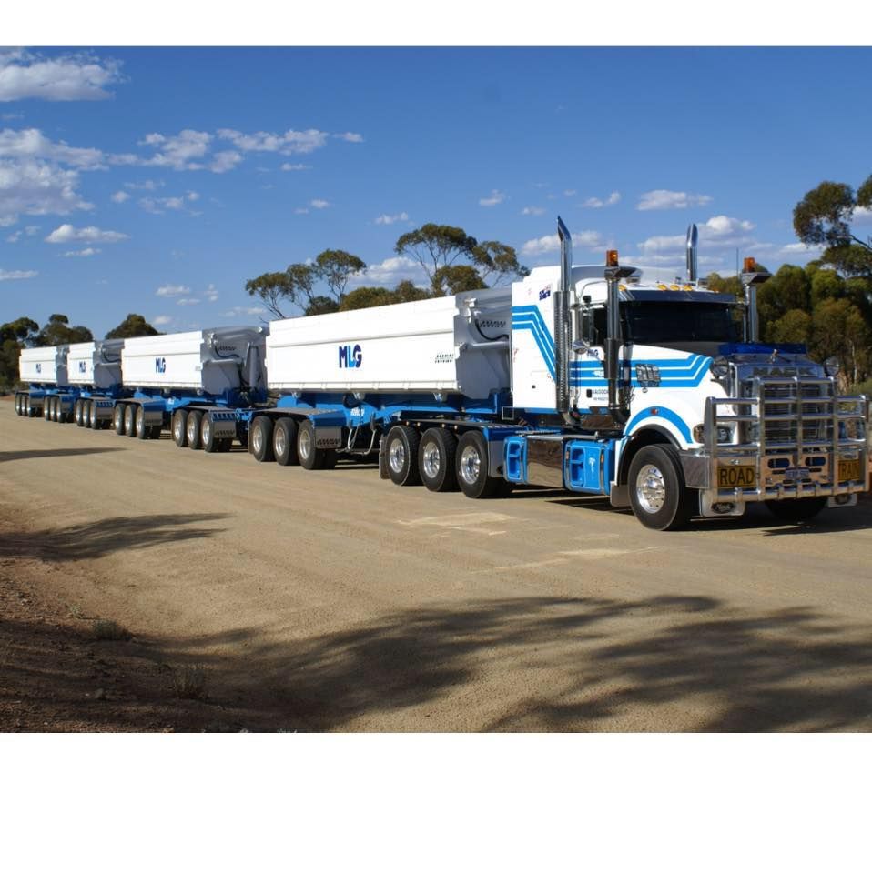 A White and Blue Semi-Truck with Multiple Trailers — Aust. Advanced Trailer Sales & Service in Berrimah, NT
