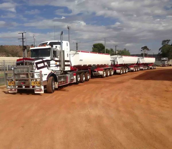 A White and Red Semi-Truck with Multiple Tanker Trailers — Aust. Advanced Trailer Sales & Service in Berrimah, NT
