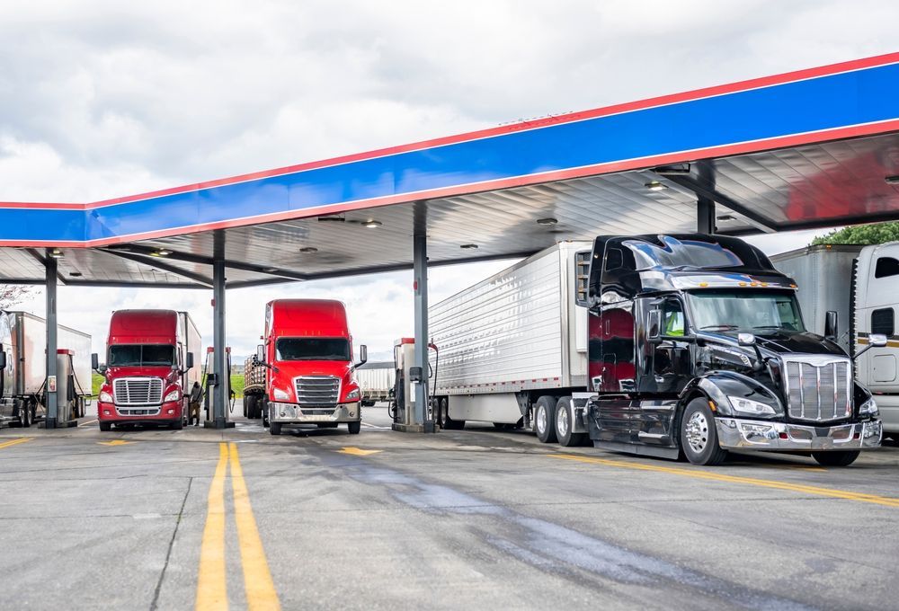 A Trucks Parked at A Gas Station with A Canopy — Aust. Advanced Trailer Sales & Service in Berrimah, NT