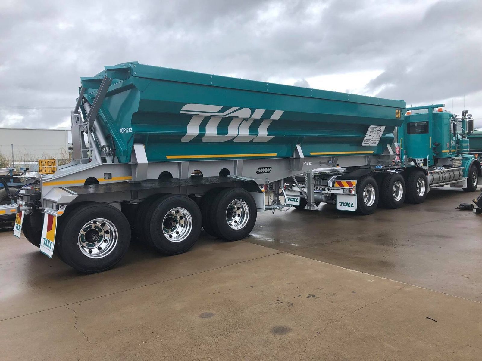 A Teal Dump Truck Trailer with Silver Wheels — Aust. Advanced Trailer Sales & Service in Berrimah, NT