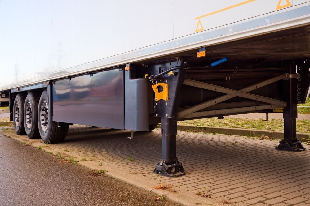 Semi-trailer Propped Up by Legs on a Brick Surface — Aust. Advanced Trailer Sales & Service in Berrimah, NT