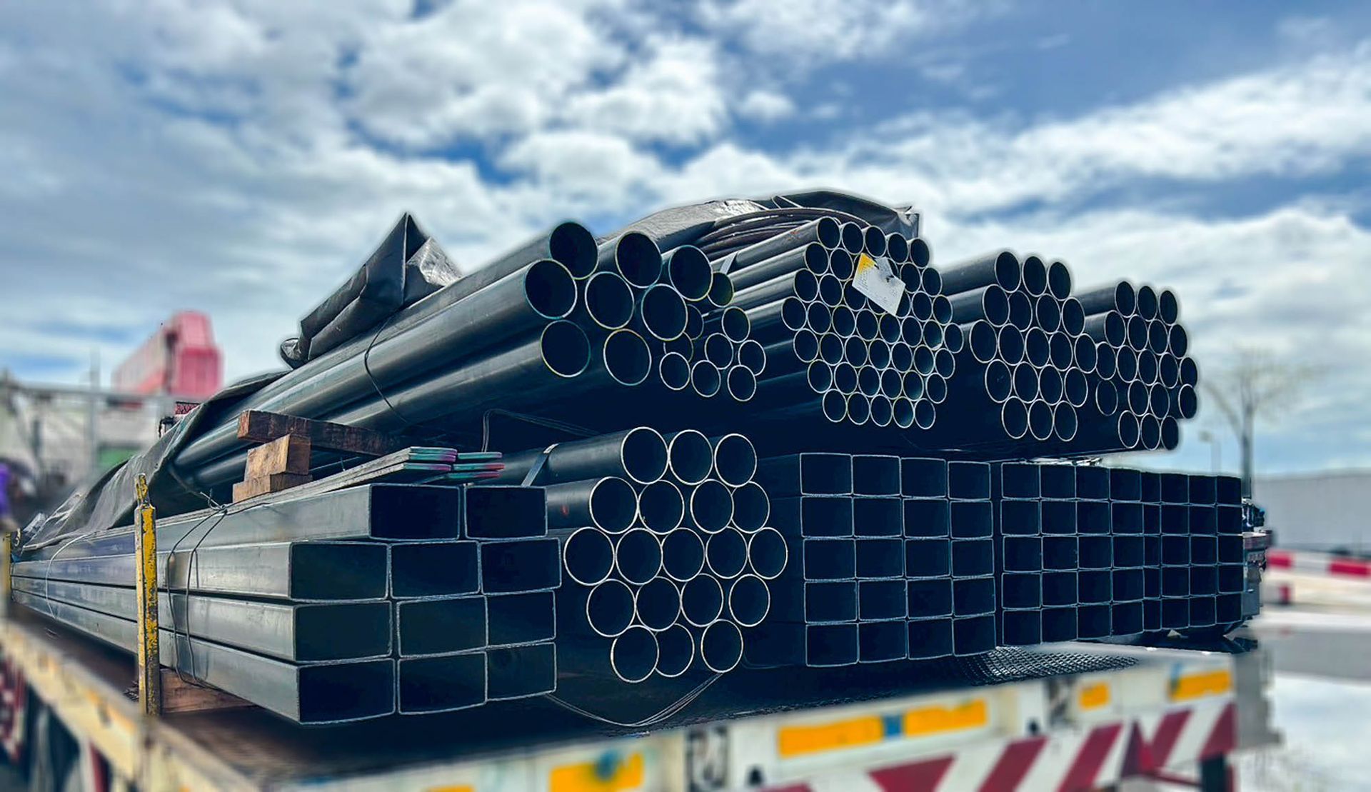 Metal construction products on a vehicle for transportation.